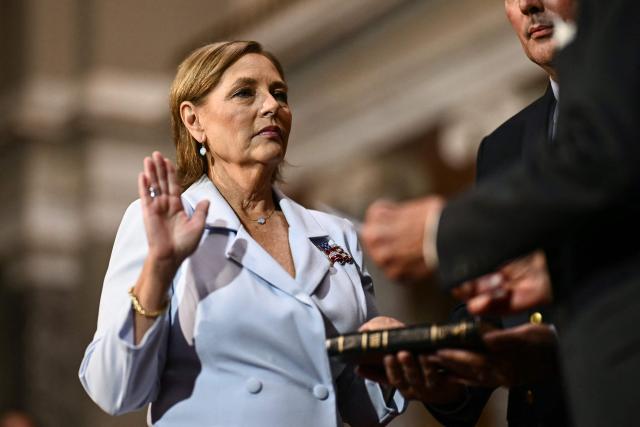 Darline Graham Nordone, sister of Lindsey Graham, is ceremonially sworn in as a US Senator by Senator Charles Grassley, Republican from Iowa, (out of frame) in the Old Senate Chamber at the US Capitol in Washington, DC, on July 14, 2026. South Carolina Governor Henry McMaster on July 13 appointed the late Republican senator Lindsey Graham's younger sister to complete his term, hours after President Donald Trump publicly urged him to choose her. Darline Graham Nordone will serve in the US Senate until Graham's term expires in January, following his unexpected death at the weekend at the age of 71. (Photo by Kent NISHIMURA / AFP)