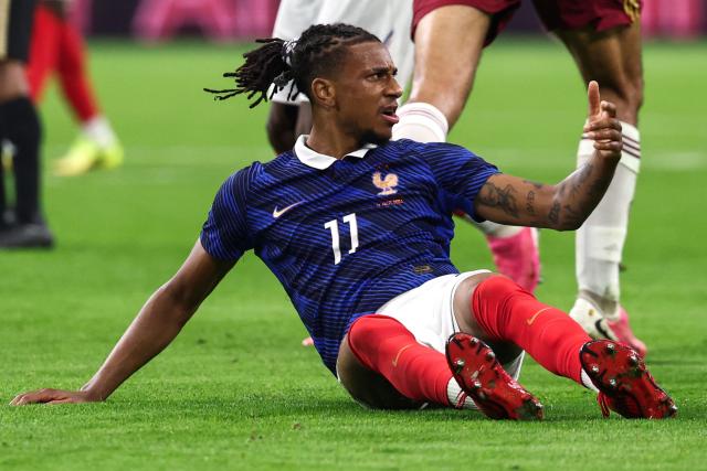 France's forward #11 Michael Olise reacts on the field during the 2026 World Cup football tournament semi-final match between France and Spain at the Dallas Stadium in Arlington on July 14, 2026.  (Photo by FRANCK FIFE / AFP)