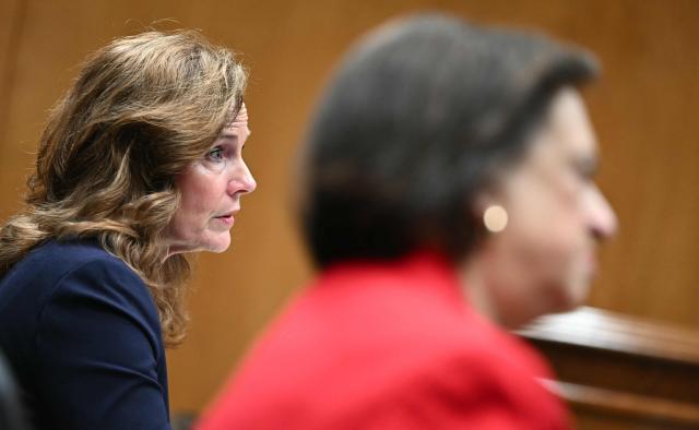 US Supreme Court Justices Amy Coney Barrett (L) and Elena Kagan testify during a Senate Appropriations Subcommittee on Financial Services hearing on Capitol Hill in Washington, DC, on July 14, 2026. (Photo by Kent NISHIMURA / AFP)