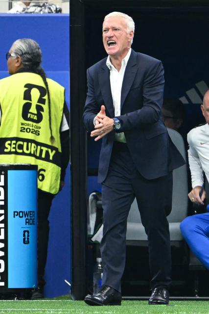 France's head coach Didier Deschamps reacts in the techinal area during the 2026 World Cup football tournament semi-final match between France and Spain at the Dallas Stadium in Arlington on July 14, 2026.  (Photo by RONALDO SCHEMIDT / AFP)