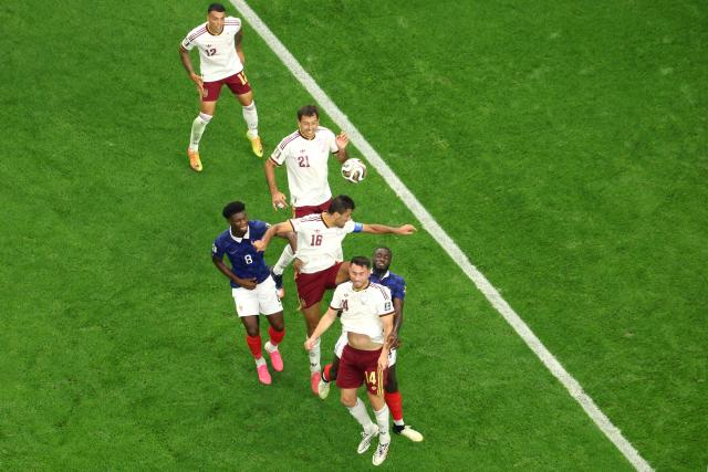 Spain's midfielder #16 Rodri (C) heads the ball during the 2026 World Cup football tournament semi-final match between France and Spain at the Dallas Stadium in Arlington on July 14, 2026.  (Photo by Odd ANDERSEN / AFP)
