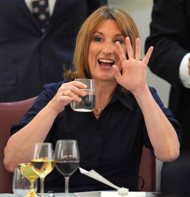 Britain's Chancellor of the Exchequer Rachel Reeves waves to a fellow guest before delivering a speech at the annual Financial and Professional Services Dinner at Mansion House in London on July 14, 2026. (Photo by Yui Mok / POOL / AFP)