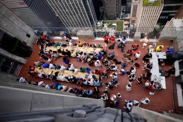 Fans attend a watch party for the World Cup semifinal football match between France and Spain at The Top of the Rock at Rockefeller Center in New York on July 14, 2026. (Photo by Leonardo Munoz / AFP)