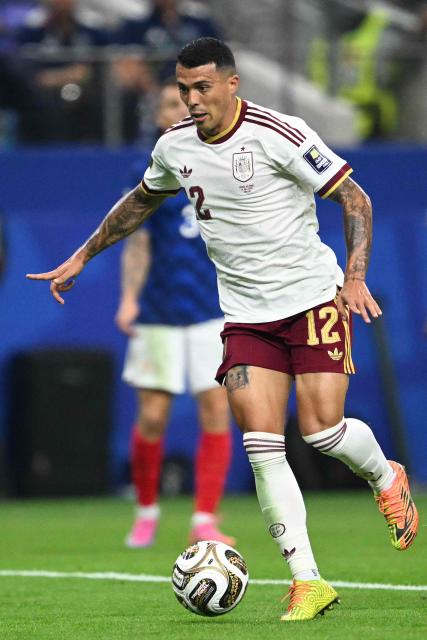 Spain's defender #12 Pedro Porro runs with the ball during the 2026 World Cup football tournament semi-final match between France and Spain at the Dallas Stadium in Arlington on July 14, 2026.  (Photo by MAURO PIMENTEL / AFP)