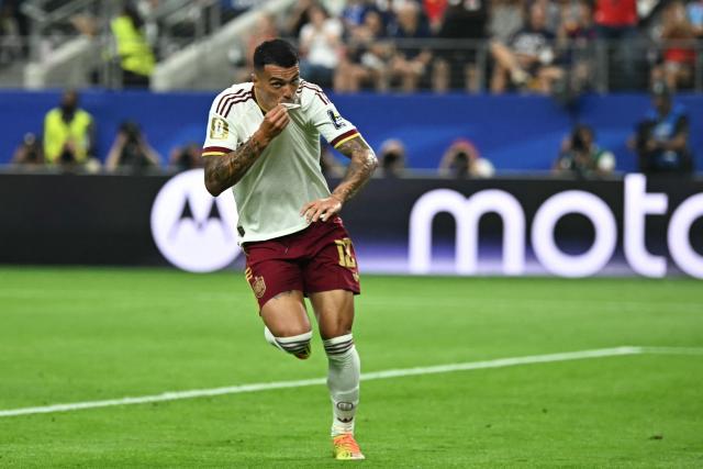 Spain's defender #12 Pedro Porro celebrates scoring his team's second goal during the 2026 World Cup football tournament semi-final match between France and Spain at the Dallas Stadium in Arlington on July 14, 2026.  (Photo by Paul ELLIS / AFP)