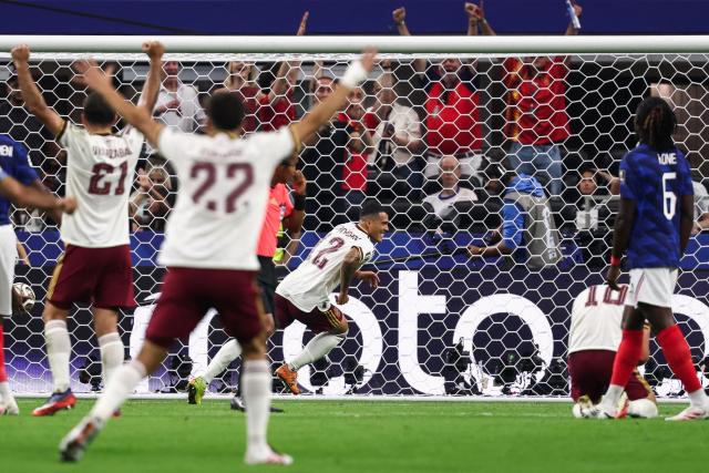 Spain's defender #12 Pedro Porro celebrates scoring his team's second goal during the 2026 World Cup football tournament semi-final match between France and Spain at the Dallas Stadium in Arlington on July 14, 2026.  (Photo by FRANCK FIFE / AFP)