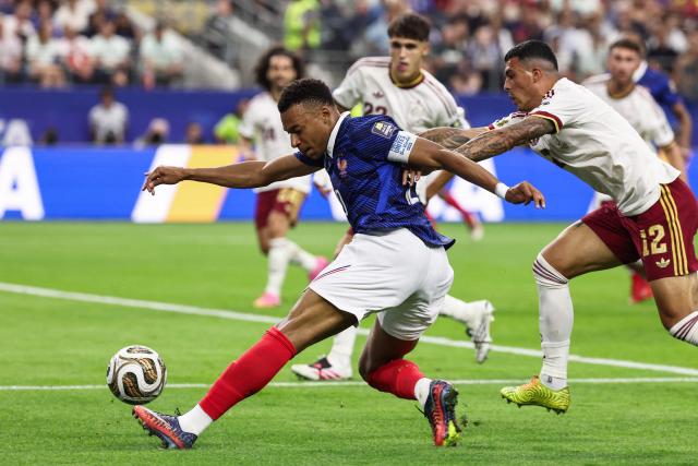France's forward #10 Kylian Mbappe kicks the ball during the 2026 World Cup football tournament semi-final match between France and Spain at the Dallas Stadium in Arlington on July 14, 2026.  (Photo by FRANCK FIFE / AFP)