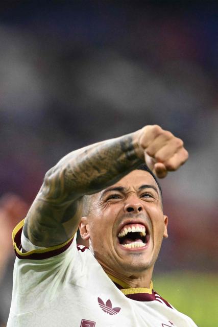 Spain's defender #12 Pedro Porro celebrates after his team won the 2026 World Cup football tournament semi-final match between France and Spain at the Dallas Stadium in Arlington on July 14, 2026.  (Photo by MAURO PIMENTEL / AFP)