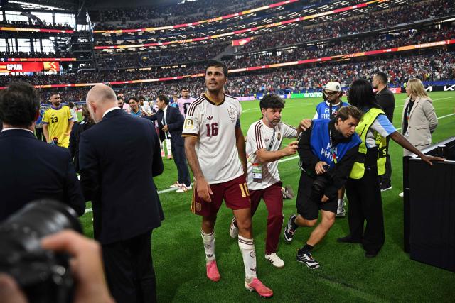 Spain's midfielder #16 Rodri walks off the pitch after his team won the 2026 World Cup football tournament semi-final match between France and Spain at the Dallas Stadium in Arlington on July 14, 2026.  (Photo by Paul ELLIS / AFP)