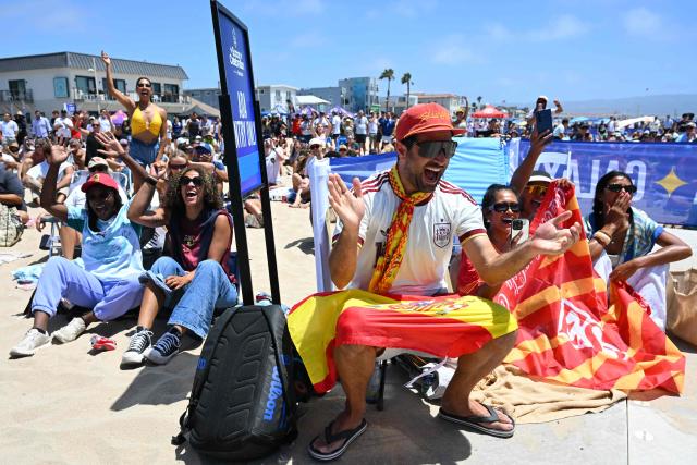 Spain fans react while watching the 2026 World Cup semi-final game between France and Spain during the LA Galaxy Soccer Celebration in Hermosa Beach, California on July 14, 2026. (Photo by Patrick T. Fallon / AFP)
