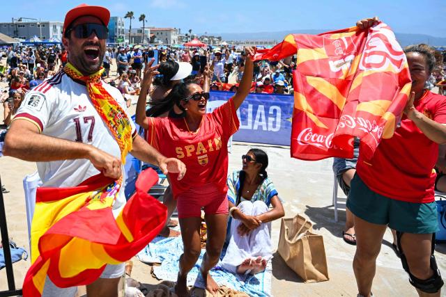 Spain fans react while watching the 2026 World Cup semi-final game between France and Spain during the LA Galaxy Soccer Celebration in Hermosa Beach, California on July 14, 2026. (Photo by Patrick T. Fallon / AFP)