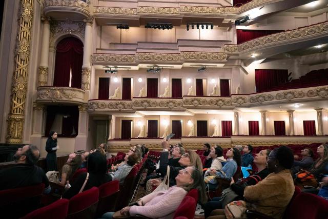 Visitors take part in a guided tour at the Theatro Municipal do Rio de Janeiro (Rio de Janeiro's Municipal Theater) during celebrations marking its 117th anniversary with a series of events open to the public, on July 14, 2026, in Rio de Janeiro, Brazil. (Photo by Pablo PORCIUNCULA / AFP)