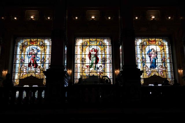 This image shows stained glass windows at the Theatro Municipal do Rio de Janeiro (Rio de Janeiro's Municipal Theater) during celebrations marking its 117th anniversary with a series of events open to the public, on July 14, 2026, in Rio de Janeiro, Brazil. (Photo by Pablo PORCIUNCULA / AFP)