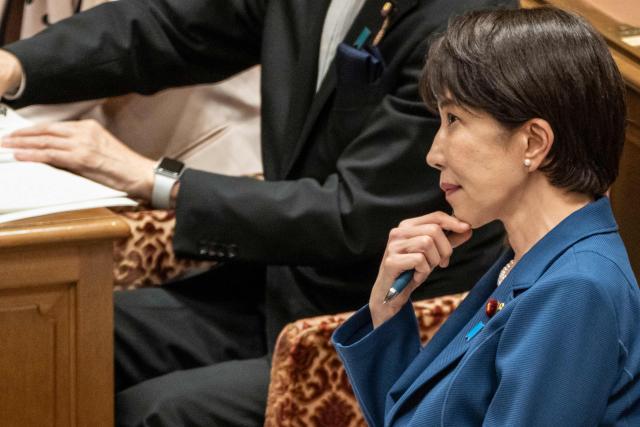 Japan's Prime Minister Sanae Takaichi attends the joint meeting of the committees of both houses on fundamental national policies at the National Diet in Tokyo on July 15, 2026. (Photo by Yuichi YAMAZAKI / AFP)