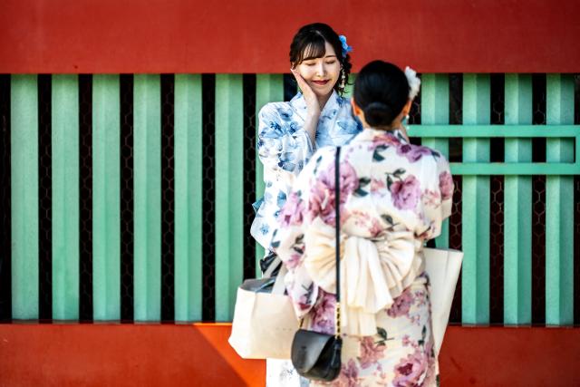 People take pictures at the Sensoji Temple in Tokyo on July 15, 2026. (Photo by Philip FONG / AFP)