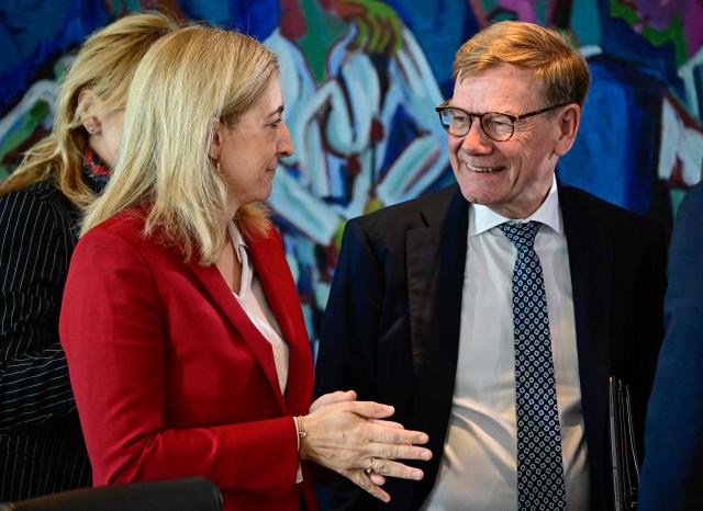 German Health Minister Nina Warken an Germany's Foreign Minister  Johann Wadephul talk prior the start of a weekly meeting of the German cabinet themed on easing the bureaucratic burden in the country at the Chancellery in Berlin, on July 15, 2026. (Photo by Tobias SCHWARZ / AFP)