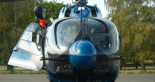 This frame grab from an AFP TV video shows the new helicopter H145 D3 of the French gendarmerie preparing to leave the 107th Air Base in Velizy-Villacoublay to take part in the annual Bastille Day military parade in Paris, on July 14, 2026. The H145 D3, has been in service for the past five months and its performance is enhanced by innovative technological features such as optronics sensors, reinforced ballistic protection and a secure data transmission system. Two helicopters of this type were funded by the British via the Sandhurst Fund, as part of the Sandhurst Cooperation Treaty between France and the United Kingdom, aimed at curbing illegal crossings of the English Channel. This treaty was signed on January 18, 2018 during the 35th Franco-British summit. A second helicopter has been delivered to Amiens. Four more are due to be delivered by 2028. (Photo by Benoît DUCROCQ / AFP)