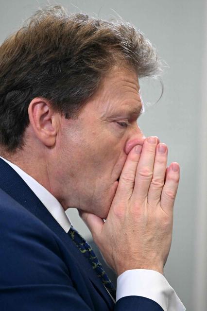 Reform UK Deputy Leader Richard Tice reacts as he listens to Reform UK's Head of Policy Zia Yusuf (unseen) speaking during a party press conference in central London on July 15, 2026. (Photo by JUSTIN TALLIS / AFP)