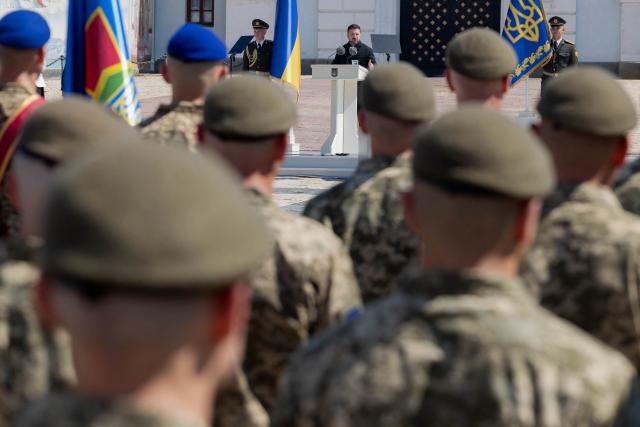 Ukraine's President Volodymyr Zelensky (C) delivers a speech to mark the Day of Ukrainian Statehood in Kyiv on July 15, 2026, amid the Russian invasion of Ukraine. (Photo by Tetiana DZHAFAROVA / AFP)