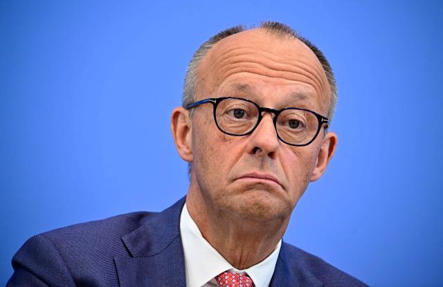 German Chancellor Friedrich Merz addresses journalists during his summer press conference in Berlin, Germany, on July 15, 2026. (Photo by Tobias SCHWARZ / AFP)