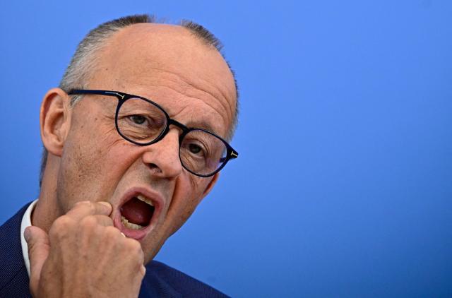 German Chancellor Friedrich Merz addresses journalists during his summer press conference in Berlin, Germany, on July 15, 2026. (Photo by Tobias SCHWARZ / AFP)