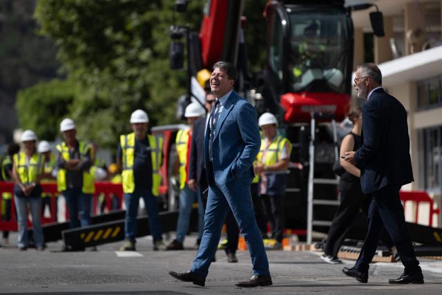 Chief Minister of Gibraltar Fabian Picardo laughs during a ceremony ending border controls between Spain and the British overseas territory of Gibraltar at the  border crossing in La Linea de la Concepcion, southern Spain, on July 15, 2026. A new era began between Spain and the tiny British territory of Gibraltar on July 15, 2026, as border checks that have long been a source of tension and frustration were finally lifted after the signing of a post-Brexit deal in Brussels between the UK, Spain, Gibraltar and the EU. (Photo by JORGE GUERRERO / AFP)