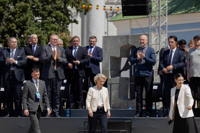 European Commission President Ursula von der Leyen (C) arrives to receive the award 'The Order of Europe' from Ukraine's President during a ceremony to mark the Day of Ukrainian Statehood in Kyiv on July 15, 2026, amid the Russian invasion of Ukraine. (Photo by Tetiana DZHAFAROVA / AFP)