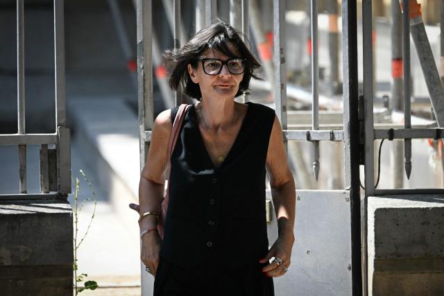 Sandra Vazquez, one of the lawyers of Jerome Barella, suspected of the killing of 11-year-old Lyhanna, leaves the Agen courthouse on July 15, 2026. The death and rape of Lyhanna, an 11-year-old middle school student who went missing in late May before being found dead on June 4 in the Gers, has stirred a wave of anger and emotion across the country, with an inspection mission concluding there were failures in the justice system. Barella, a 41-year-old father of a school friend of the victim, had twice before been formally accused of raping a child, but investigations had been dropped or had stalled. (Photo by Lionel BONAVENTURE / AFP)