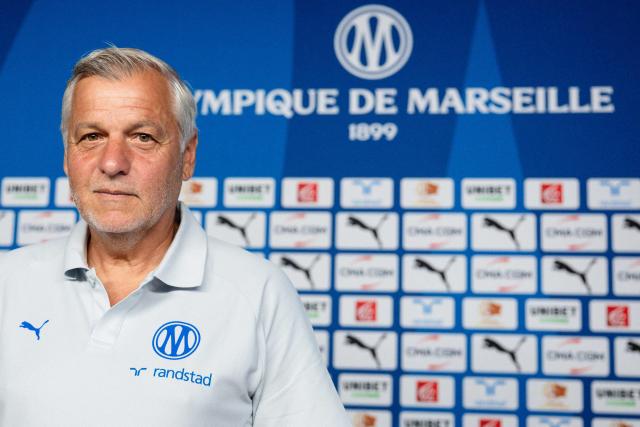 Marseille's new French head coach Bruno Genesio poses for pictures during a press conference at the Olympique de Marseille (OM) Robert-Louis-Dreyfus training centre in Marseille, southern France on July 15, 2026 (Photo by CLEMENT MAHOUDEAU / AFP)