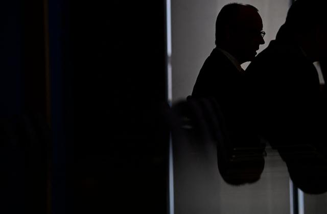 German Chancellor Friedrich Merz (L) addresses journalists during his summer press conference in Berlin, Germany, on July 15, 2026. (Photo by Tobias SCHWARZ / AFP)