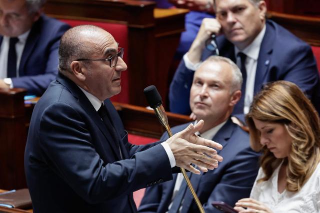 (From Top L) France's Interior Minister Laurent Nunez addresses MPs as France's junior Minister in charge of parliament relations Laurent Panifous (C) and France's Transports Minister Philippe Tabarot (C, top) look on during a session of questions to the government at The National Assembly, France's lower house of parliament in Paris on July 15, 2026. (Photo by STEPHANE DE SAKUTIN / AFP)