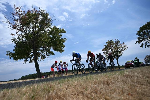 (From L) Movistar Team's Portuguese rider Nelson Oliveira, Uno-X Mobility team's Danish rider Anthon Charmig, TotalEnergies team's French rider Mathis Le Berre and Tudor Pro Cycling Team's French rider Julian Alaphilippe cycle in a breakaway during the 11th stage of the 113th edition of the Tour de France cycling race, 161,3 km between Vichy and Nevers in central France, on July 15, 2026. (Photo by Loic VENANCE / AFP)