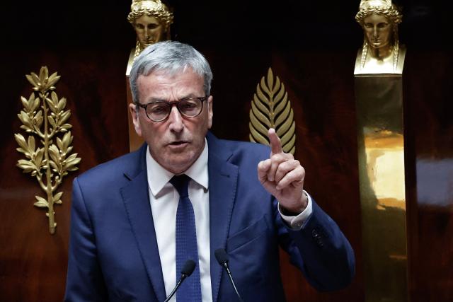 Les Democrates' MP and rapporteur Philippe Vigier addresses MPs during the exam session of the vote on the assisted dying bill at the National Assembly, France's lower house of parliament in Paris on July 15, 2026. France is set to move closer to joining the ranks of countries that guarantee the right to assisted dying, after the long journey to adoption of a controversial bill. (Photo by STEPHANE DE SAKUTIN / AFP)