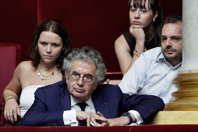 Co-rapporteur of the 'Claeys-Leonetti' law Alain Claeys (R) attends the exam session of the vote on the assisted dying bill at the National Assembly, France's lower house of parliament in Paris on July 15, 2026. France is set to move closer to joining the ranks of countries that guarantee the right to assisted dying, after the long journey to adoption of a controversial bill. (Photo by STEPHANE DE SAKUTIN / AFP)