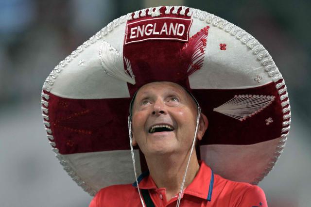 An England supporter wearing a sombrero looks on from the stands ahead of the 2026 World Cup football tournament semi-final match between England and Argentina at the Atlanta Stadium in Atlanta on July 15, 2026.  (Photo by JUAN MABROMATA / AFP)