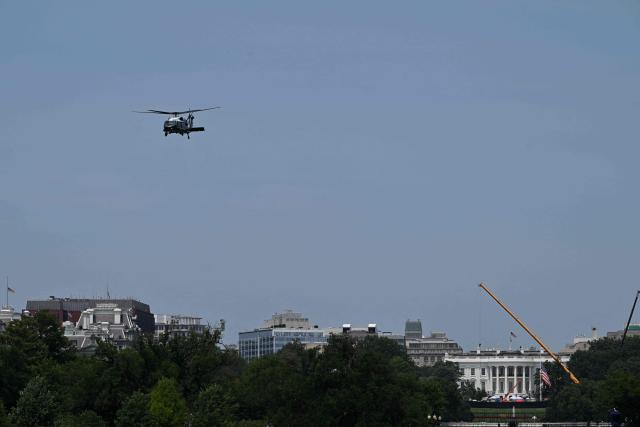 Marine One carrying US President Donald Trump departs from the Ellipse near the White House (background) in Washington, DC, on July 15, 2026. President Trump is travelling to Carlisle, Pennsylania to attend the Pennsylvania Defense and Innovation Summit (Photo by Alex WROBLEWSKI / AFP)