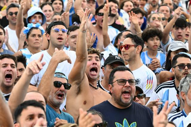 Argentina fans react during a watch party for the 2026 World Cup semi-final match between England and Argentina in Miami Beach, Florida, on July 15, 2026. (Photo by CHANDAN KHANNA / AFP)