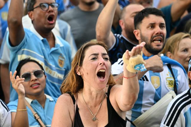 Argentina fans react during a watch party for the 2026 World Cup semi-final match between England and Argentina in Miami Beach, Florida, on July 15, 2026. (Photo by CHANDAN KHANNA / AFP)