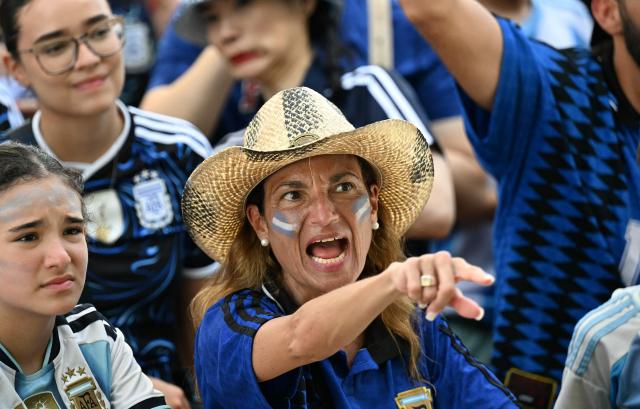 Argentina fans react during a watch party for the 2026 World Cup semi-final match between England and Argentina in Miami Beach, Florida, on July 15, 2026. (Photo by CHANDAN KHANNA / AFP)