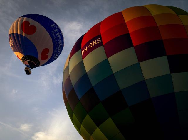 This photograph shows hot air balloons during the 40th edition of the Frisian Balloon Festival in Joure, northern Netherlands on July 15, 2026. (Photo by Koen van Weel / ANP / AFP) / Netherlands OUT