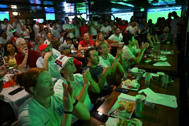 England fans watch the 2026 World Cup semi-final match between England and Argentina at the Underground Pub & Grill in Hermosa Beach, California on July 15, 2026. (Photo by Patrick T. Fallon / AFP)