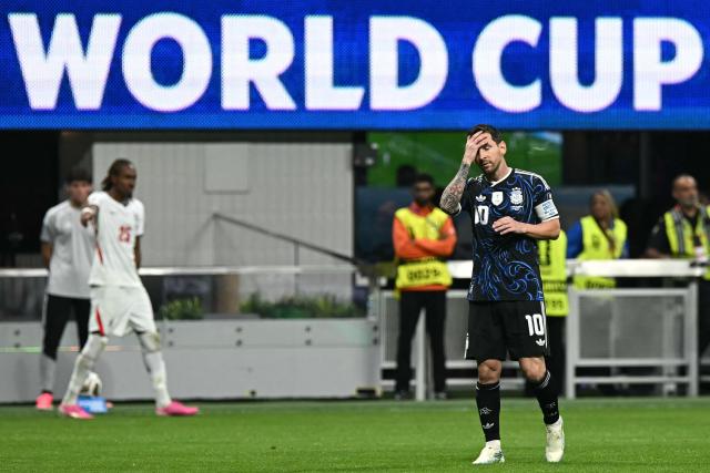 Argentina's forward #10 Lionel Messi reacts after England scored the opening goal during the 2026 World Cup football tournament semi-final match between England and Argentina at the Atlanta Stadium in Atlanta on July 15, 2026.  (Photo by Paul ELLIS / AFP)