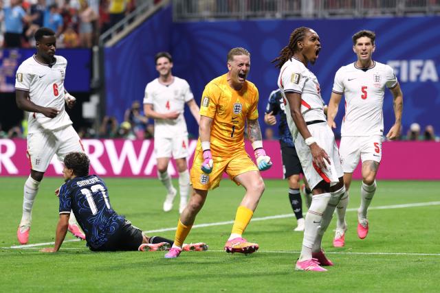 England's goalkeeper #01 Jordan Pickford and England's defender #25 Djed Spence react next to England's defender #06 Marc Guehi, Argentina's forward #17 Giuliano Simeone and England's defender #05 John Stones during the 2026 World Cup football tournament semi-final match between England and Argentina at the Atlanta Stadium in Atlanta on July 15, 2026.  (Photo by Thomas COEX / AFP)