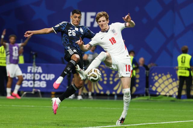 Argentina's defender #26 Nahuel Molina and England's forward #18 Anthony Gordon fight for the ball during the 2026 World Cup football tournament semi-final match between England and Argentina at the Atlanta Stadium in Atlanta on July 15, 2026.  (Photo by Odd ANDERSEN / AFP)