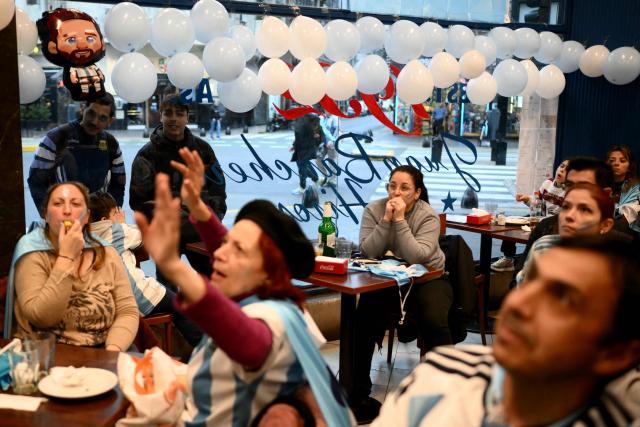 Fans of Argentina watch the 2026 FIFA World Cup semi-final football match between England and Argentina, in Buenos Aires on July 15, 2026. (Photo by Luis ROBAYO / AFP)