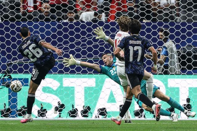 England's forward #18 Anthony Gordon shoots and scores his team's first goal during the 2026 World Cup football tournament semi-final match between England and Argentina at the Atlanta Stadium in Atlanta on July 15, 2026.  (Photo by Thomas COEX / AFP)