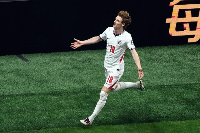 England's forward #18 Anthony Gordon celebrates scoring his team's first goal during the 2026 World Cup football tournament semi-final match between England and Argentina at the Atlanta Stadium in Atlanta on July 15, 2026.  (Photo by PATRICIA DE MELO MOREIRA / AFP)