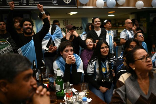 Fans of Argentina watch the 2026 FIFA World Cup semi-final football match between England and Argentina, in Buenos Aires on July 15, 2026. (Photo by Luis ROBAYO / AFP)