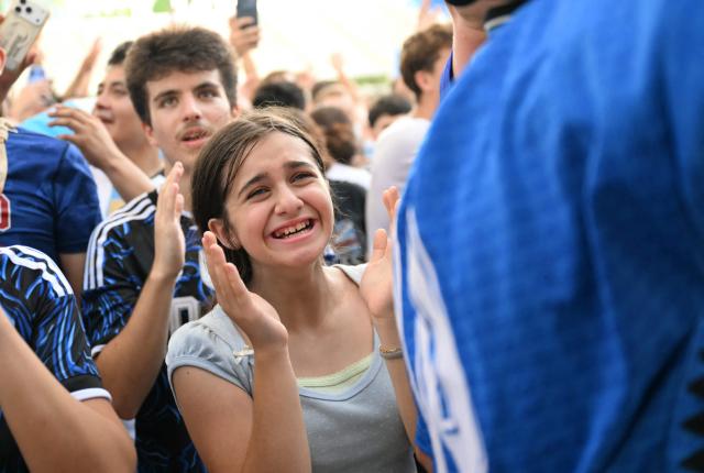Argentina fans react to their team's second goal during a watch party for the 2026 World Cup semi-final match between England and Argentina in Miami Beach, Florida, on July 15, 2026. (Photo by CHANDAN KHANNA / AFP)