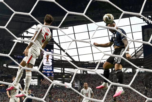 Argentina's forward #22 Lautaro Martinez heads the ball to score his team's second goal during the 2026 World Cup football tournament semi-final match between England and Argentina at the Atlanta Stadium in Atlanta on July 15, 2026.  (Photo by Paul ELLIS / AFP)